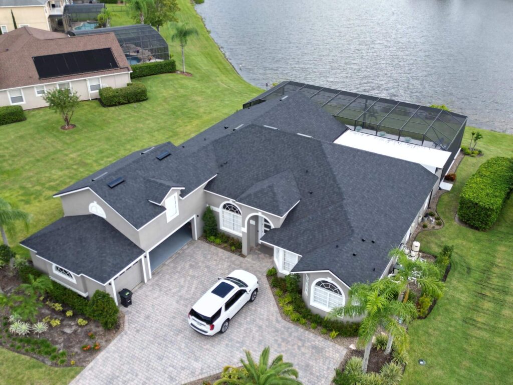 Image shows rooftop of Volusia County home with newly installed roof by Eave & Gable.