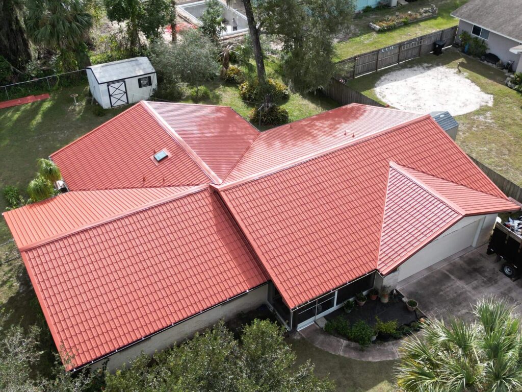 Image shows home in Seminole County Florida with newly installed red tile roof by Eave & Gable Roofing