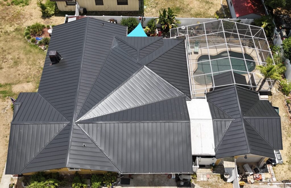 Image shows Volusia County, Florida home with a metal roof recently installed by Eave & Gable Roofing